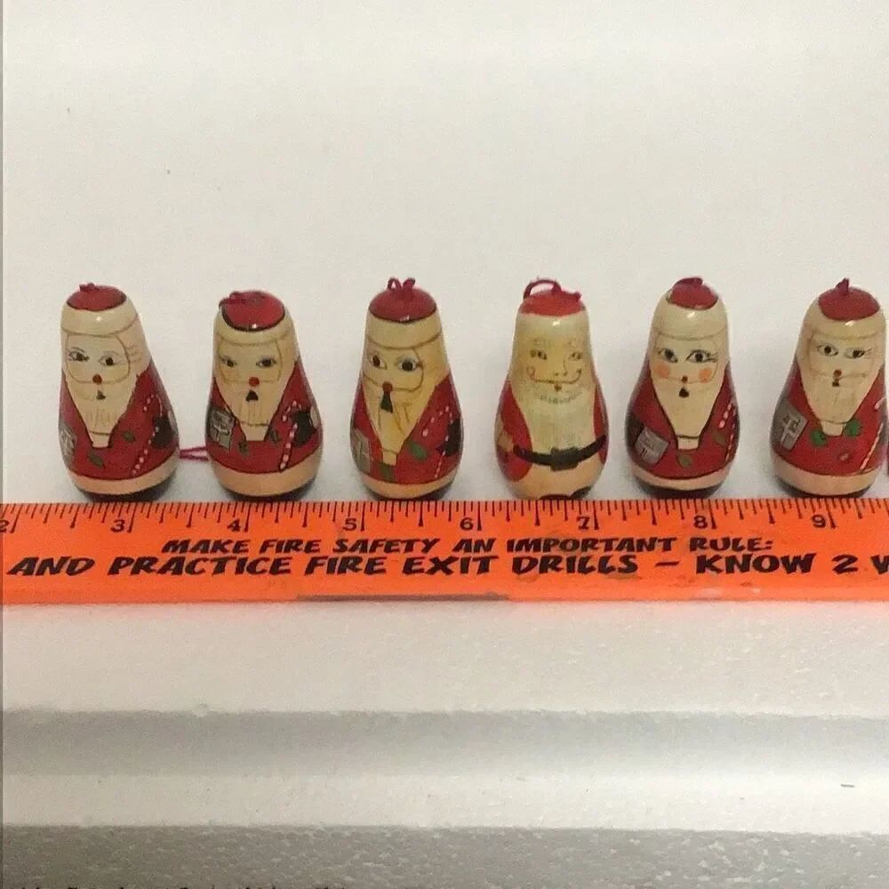 Set of six vintage wooden Santa Claus ornaments
